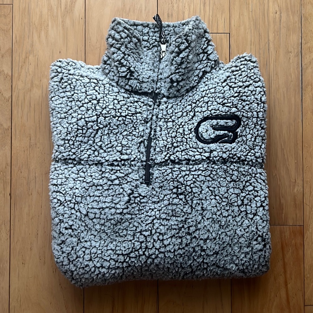 Cyclebar- branded black and white Sherpa, size small.
